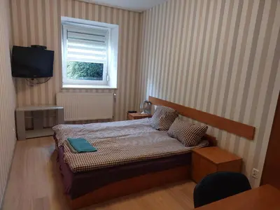 Łóżko lub łóżka w pokoju w obiekcie Noclegi Ali