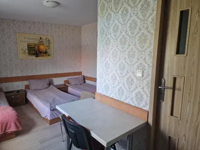 Łóżko lub łóżka w pokoju w obiekcie Noclegi Ali