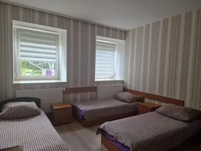 Łóżko lub łóżka w pokoju w obiekcie Noclegi Ali