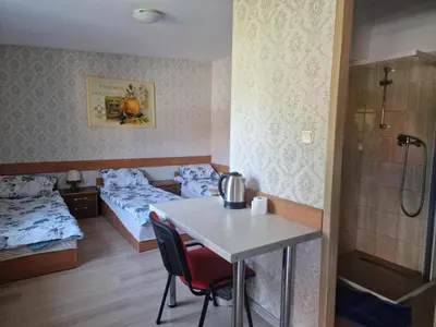 Łóżko lub łóżka w pokoju w obiekcie Noclegi Ali