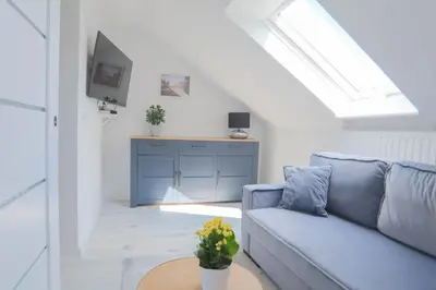 Telewizja i/lub zestaw kina domowego w obiekcie Apartament Petunia