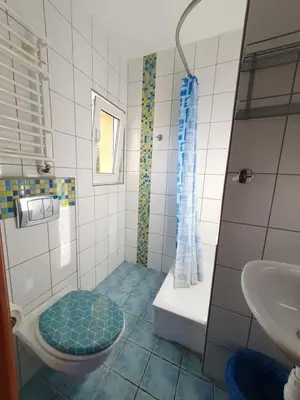 Łazienka w obiekcie Pokoje Babie Lato