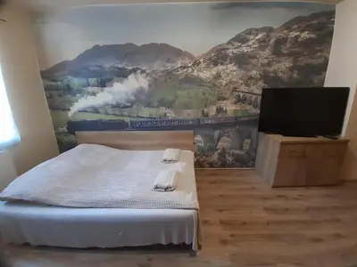 Łóżko lub łóżka w pokoju w obiekcie Pokoje Za Kinem