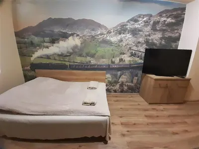 Łóżko lub łóżka w pokoju w obiekcie Pokoje Za Kinem