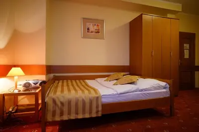 Łóżko lub łóżka w pokoju w obiekcie Noclegi w Lublińcu Lubex