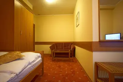 Łóżko lub łóżka w pokoju w obiekcie Noclegi w Lublińcu Lubex