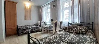 Łóżko lub łóżka w pokoju w obiekcie Hostel CION