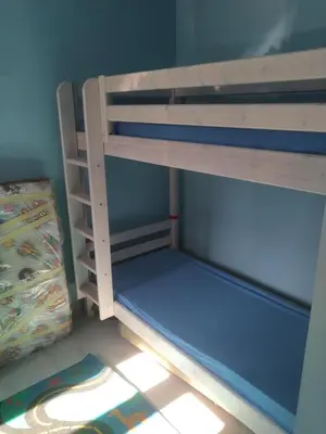 Łóżko lub łóżka w pokoju w obiekcie Hostel CION