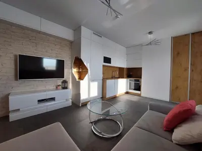 Telewizja i/lub zestaw kina domowego w obiekcie Sunset Apartament