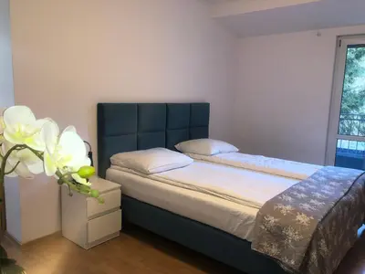 Łóżko lub łóżka w pokoju w obiekcie Villa Ola
