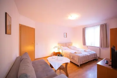 Łóżko lub łóżka w pokoju w obiekcie Villa Ola