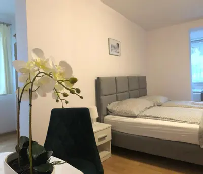 Łóżko lub łóżka w pokoju w obiekcie Villa Ola