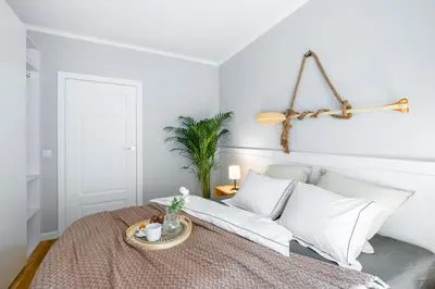 Łóżko lub łóżka w pokoju w obiekcie Komfortowy apartament z parkingiem