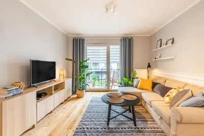 Telewizja i/lub zestaw kina domowego w obiekcie Komfortowy apartament z parkingiem
