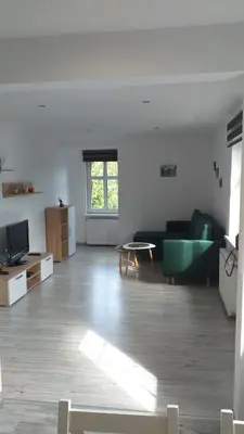 Telewizja i/lub zestaw kina domowego w obiekcie Apartament przy Papierni