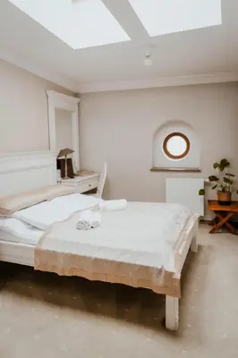 Łóżko lub łóżka w pokoju w obiekcie Hotel Adler