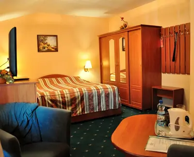 Łóżko lub łóżka w pokoju w obiekcie Pensjonat Panorama