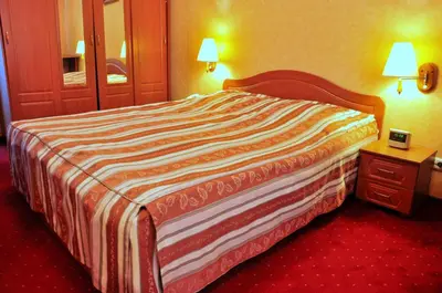Łóżko lub łóżka w pokoju w obiekcie Pensjonat Panorama