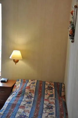 Łóżko lub łóżka w pokoju w obiekcie Pensjonat Panorama