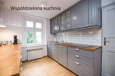 Kuchnia lub aneks kuchenny w obiekcie Pokoje Sienkiewicza