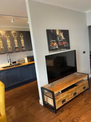Telewizja i/lub zestaw kina domowego w obiekcie Luxury Maślice Apartment