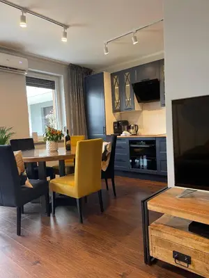 Telewizja i/lub zestaw kina domowego w obiekcie Luxury Maślice Apartment