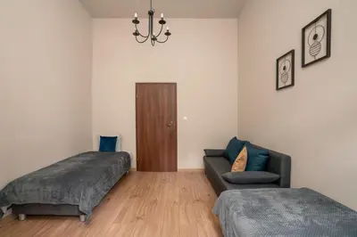 Łóżko lub łóżka w pokoju w obiekcie AS Home 9-osobowy apartament w Rynku