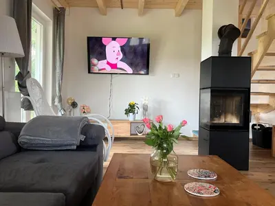 Część wypoczynkowa w obiekcie Osada Aurora Całoroczne domki z jacuzzi z widokiem na jezioro i góry