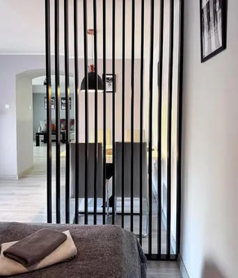 Łóżko lub łóżka w pokoju w obiekcie Apartament Dzikowiec
