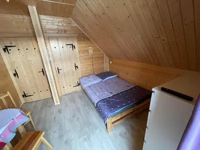 Łóżko lub łóżka w pokoju w obiekcie Agroturystyka Wudarsówka
