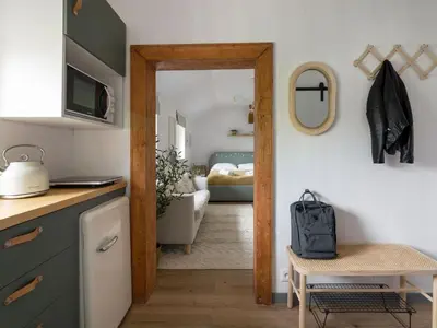 Łóżko lub łóżka w pokoju w obiekcie Apartament przy Stawie Zdrojowym