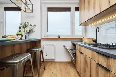Kuchnia lub aneks kuchenny w obiekcie Stylish Kwiska Apartment Wrocław by Noclegi Renters