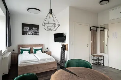 Łóżko lub łóżka w pokoju w obiekcie RentPlanet - Apartamenty Młyn Maria