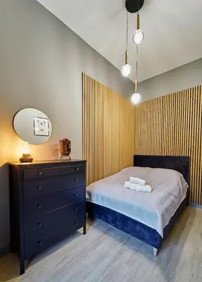 Łóżko lub łóżka w pokoju w obiekcie LAGUNA Apartament Polanica Residence 57