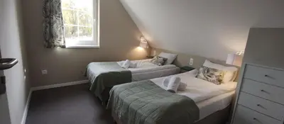 Łóżko lub łóżka w pokoju w obiekcie Róża Sudetów Domek