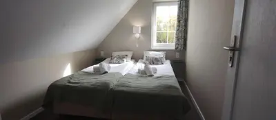 Łóżko lub łóżka w pokoju w obiekcie Róża Sudetów Domek