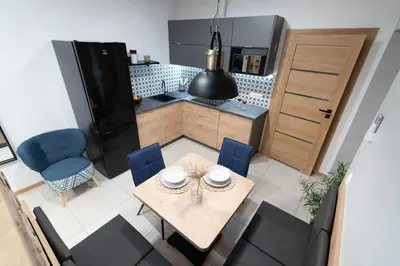 Kuchnia lub aneks kuchenny w obiekcie Apartamenty Obora
