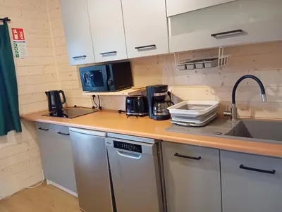 Kuchnia lub aneks kuchenny w obiekcie Sowi Stok