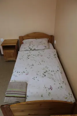 Łóżko lub łóżka w pokoju w obiekcie Hotel Sportowy