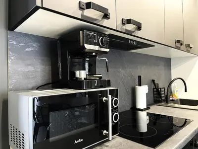Kuchnia lub aneks kuchenny w obiekcie SUNSET Apartment AirCon - Self Check-In 24h