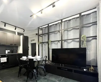 Telewizja i/lub zestaw kina domowego w obiekcie SUNSET Apartment AirCon - Self Check-In 24h