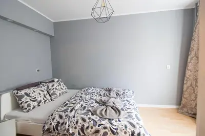Łóżko lub łóżka w pokoju w obiekcie Happy Apartments - Economy