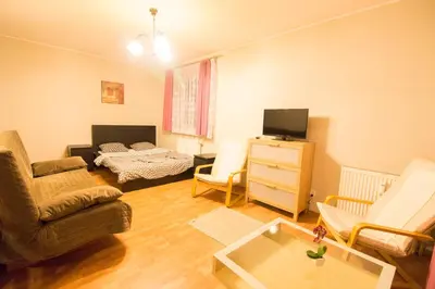 Telewizja i/lub zestaw kina domowego w obiekcie Happy Apartments - Economy