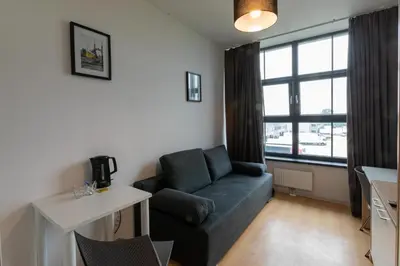 Część wypoczynkowa w obiekcie SleepWell Apartments