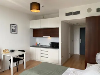 Kuchnia lub aneks kuchenny w obiekcie SleepWell Apartments