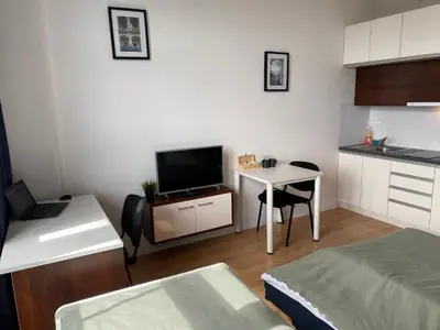 Kuchnia lub aneks kuchenny w obiekcie SleepWell Apartments