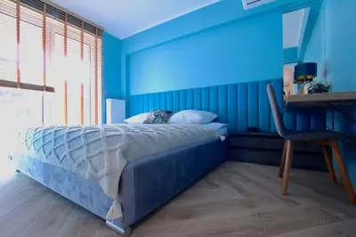 Łóżko lub łóżka w pokoju w obiekcie 5-star apartment