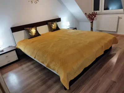 Łóżko lub łóżka w pokoju w obiekcie Apartament Marzenie 4 - Opole