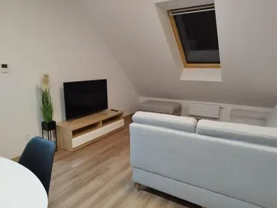 Telewizja i/lub zestaw kina domowego w obiekcie Apartament Marzenie 4 - Opole