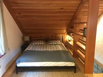 Łóżko lub łóżka w pokoju w obiekcie Domek nad potokiem